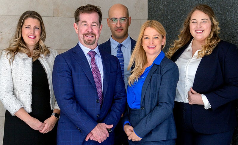 Photo of all five attorneys at Greenslade Cronk LLP